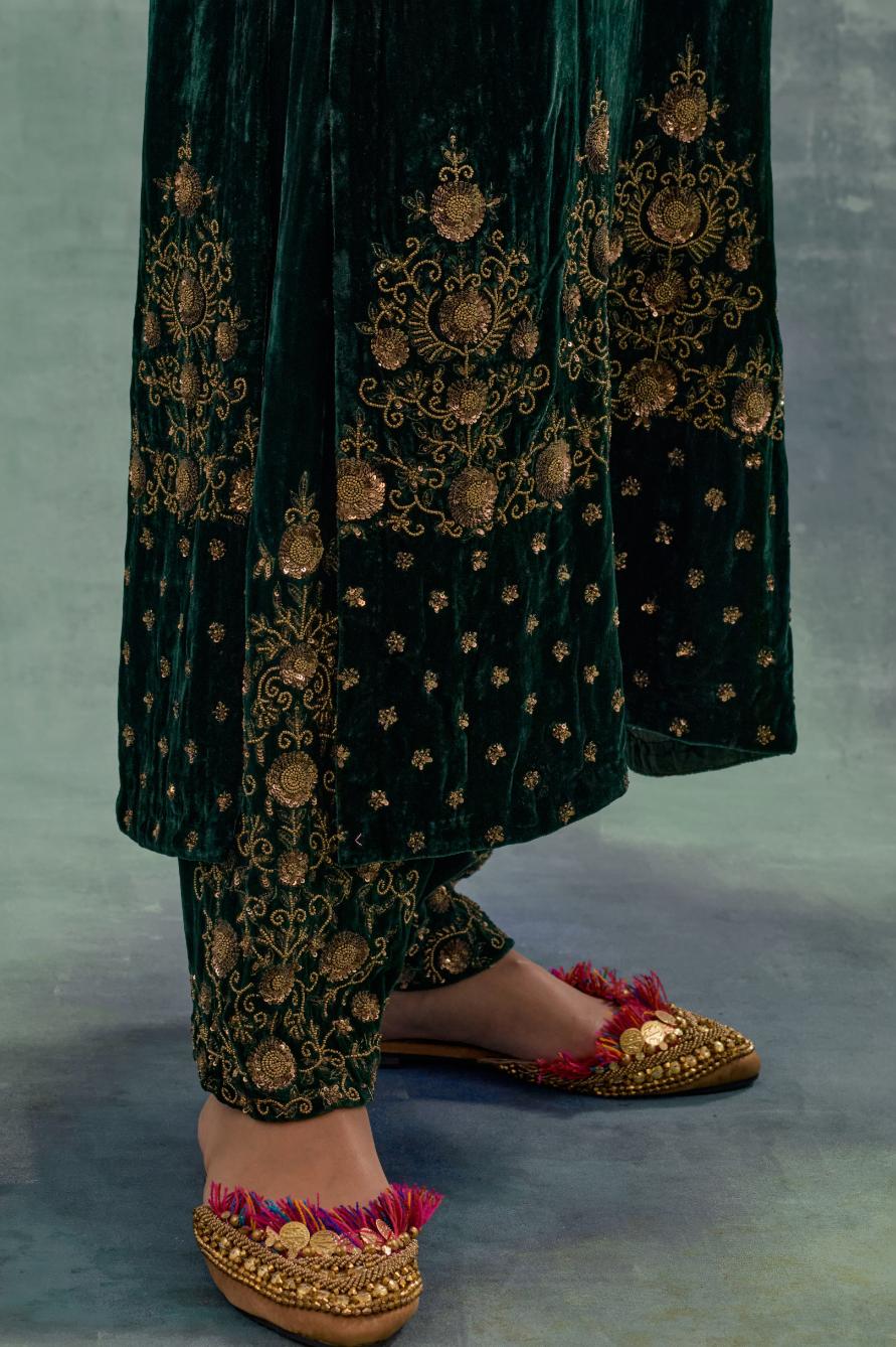 Emerald Green straight long kurta Set in Silk Velvet with hand-embroidered bead, sequins and zari detailing on neck, sleeves and hem.