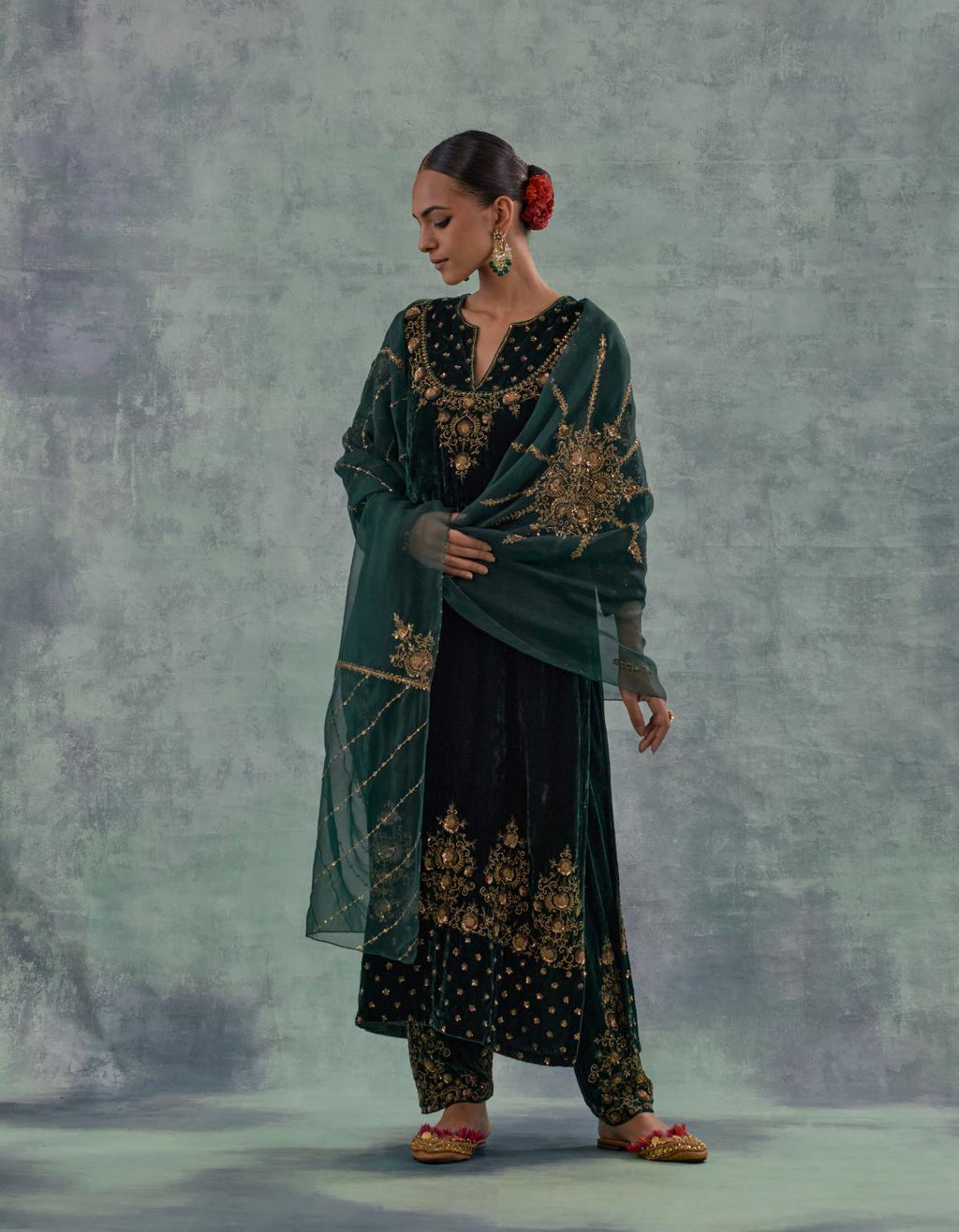 Emerald GreenSilk organza dupatta with delicate bead, sequin and zari work.