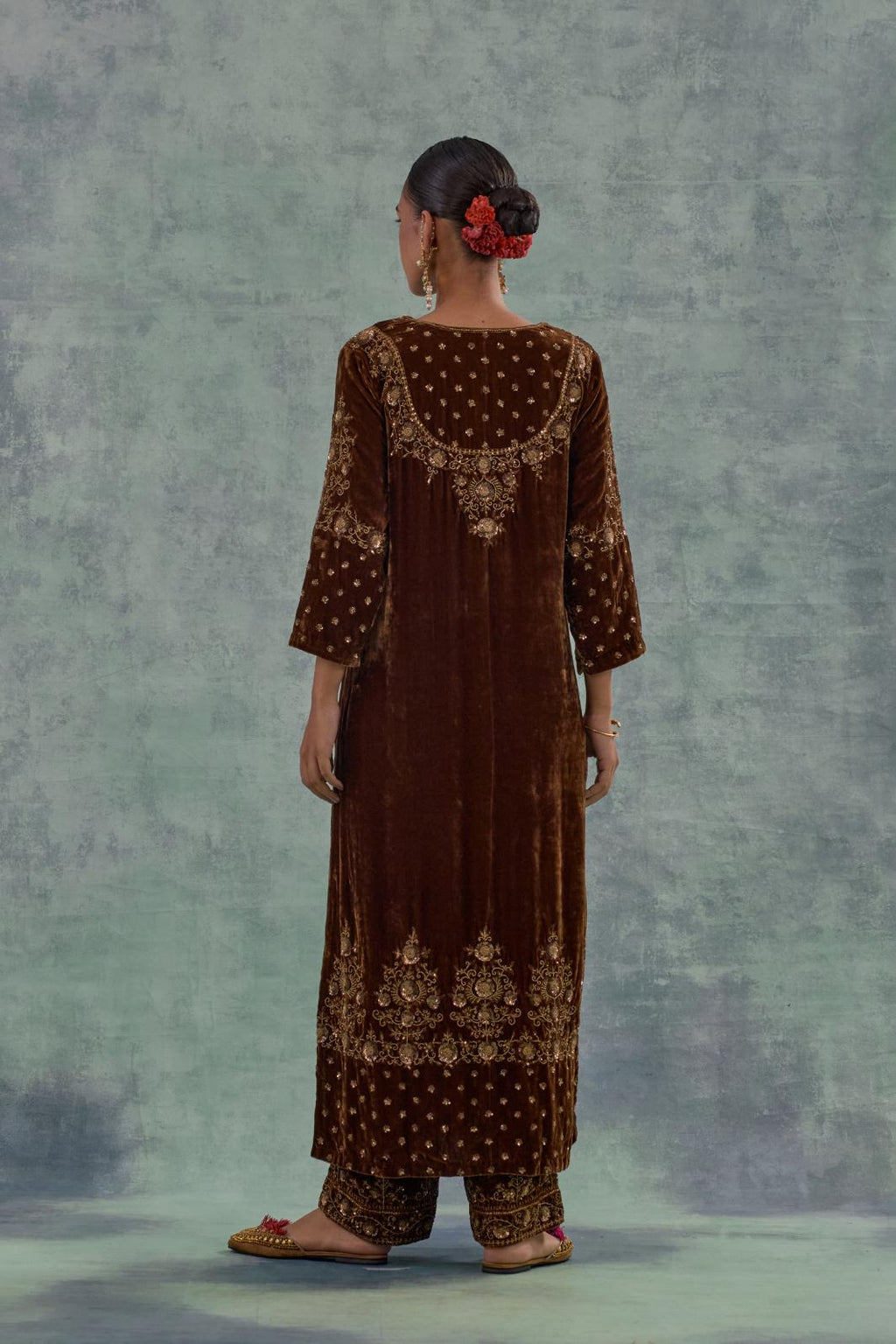 Russet straight long kurta set in Silk Velvet with hand-embroidered bead, sequins and zari detailing on neck, sleeves and hem.