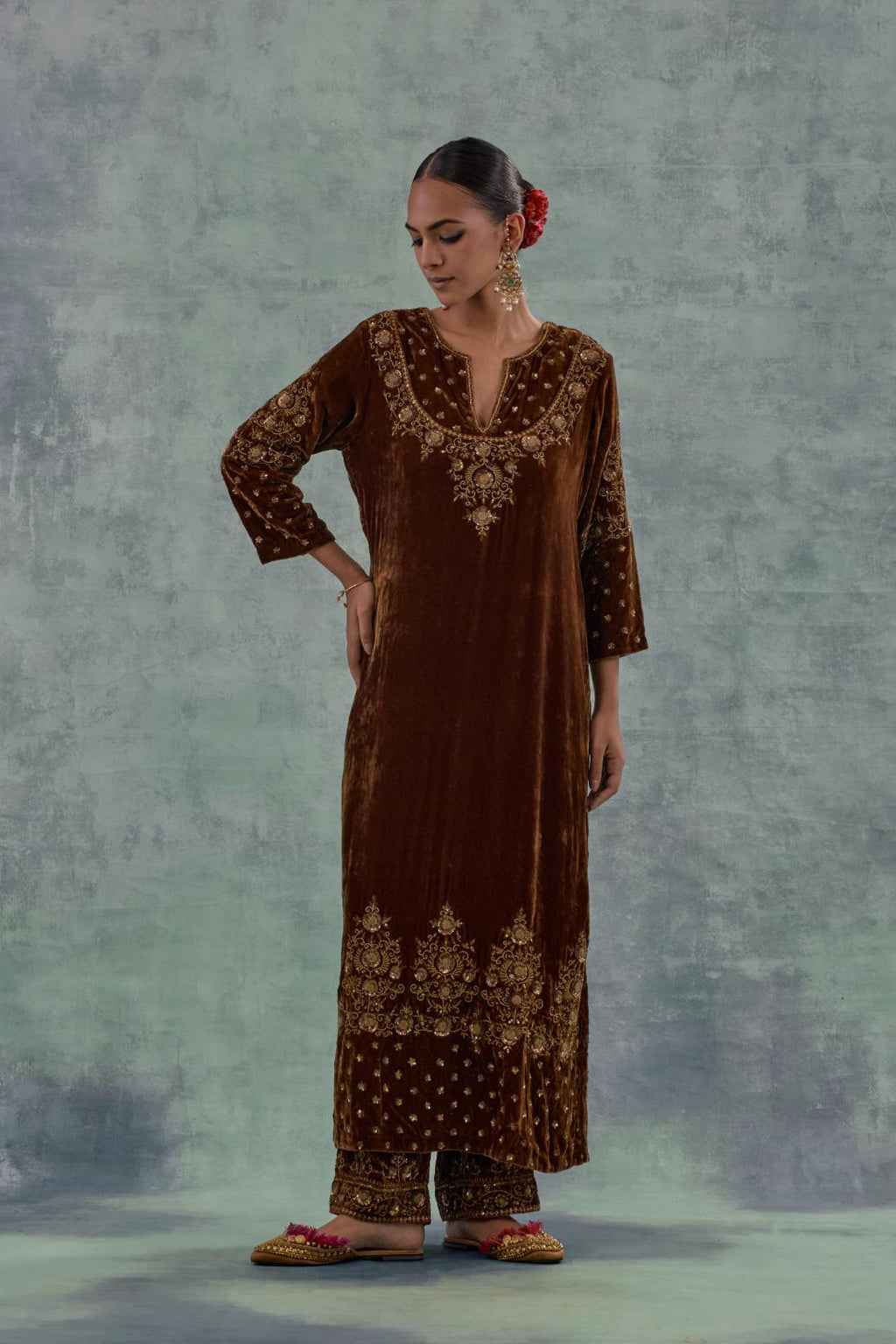 Russet straight long kurta set in Silk Velvet with hand-embroidered bead, sequins and zari detailing on neck, sleeves and hem.