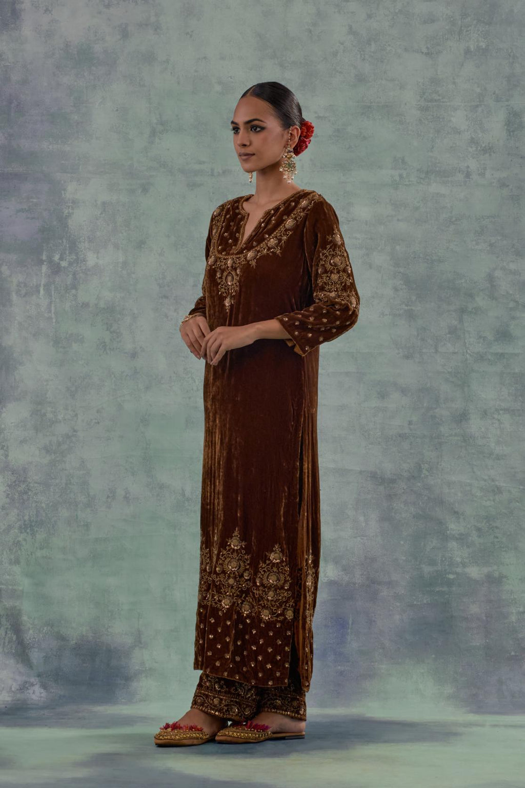 Russet straight long kurta set in Silk Velvet with hand-embroidered bead, sequins and zari detailing on neck, sleeves and hem.