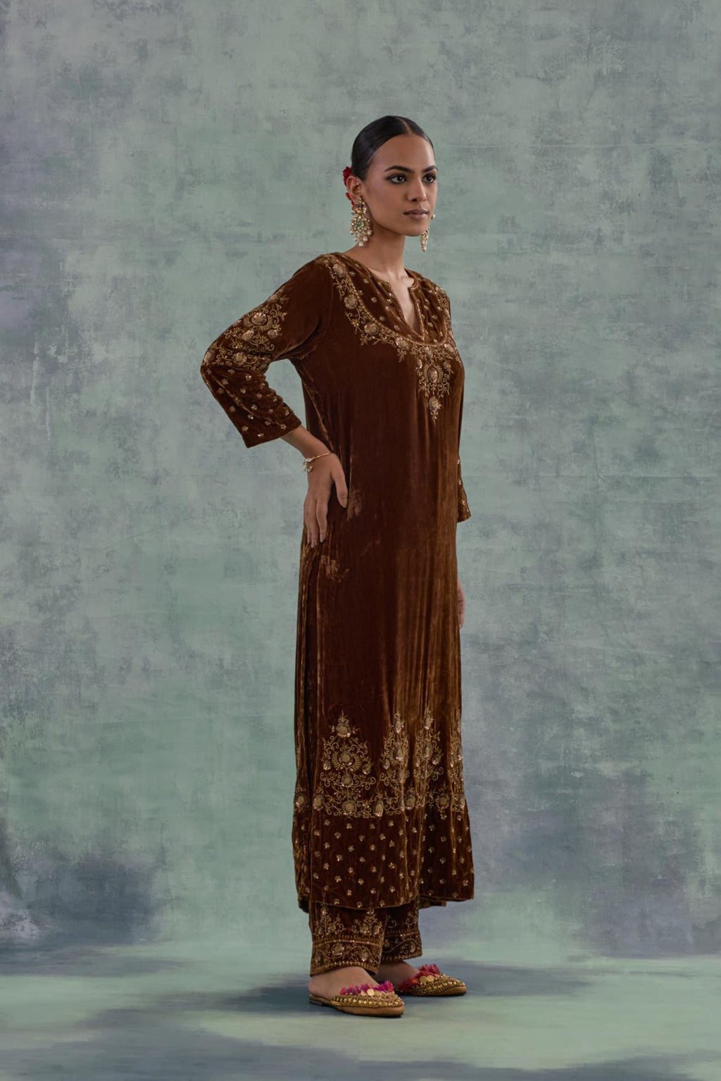 Russet straight long kurta set in Silk Velvet with hand-embroidered bead, sequins and zari detailing on neck, sleeves and hem.