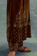 Russet straight long kurta set in Silk Velvet with hand-embroidered bead, sequins and zari detailing on neck, sleeves and hem.