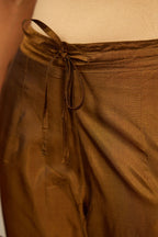 Golden olive silk pants with dori embroidered bootas at hem.
