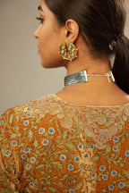 Mustard yellow silk velvet straight kurta set with delicate thread embroidery jaal all-over offset with bold gold dori embroidery at neck, sleeves and hem.