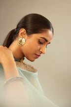 Mustard yellow silk velvet straight kurta set with delicate thread embroidery jaal all-over offset with bold gold dori embroidery at neck, sleeves and hem.