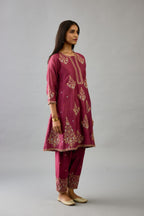 Wine silk chanderi short kalidar phiran style kurta set with dori and contrast silk thread embroidery, highlighted with gold sequins work.