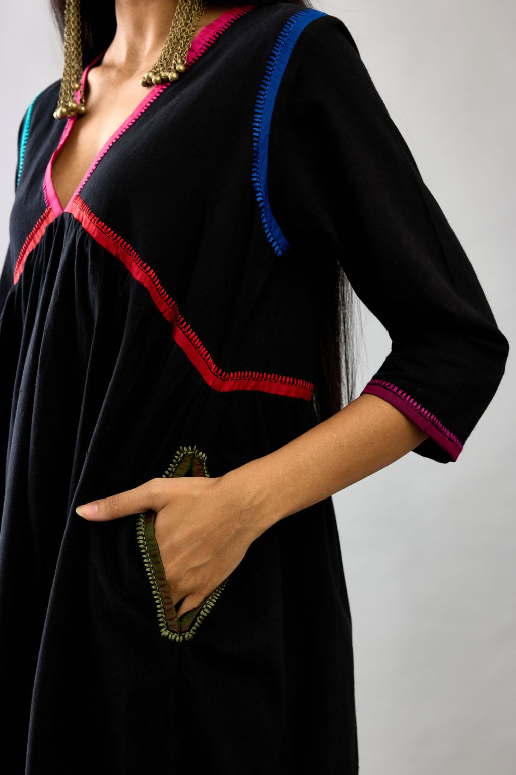 Black Handloom Cotton kurta set dress with multi colored silk facing and embroidery details.