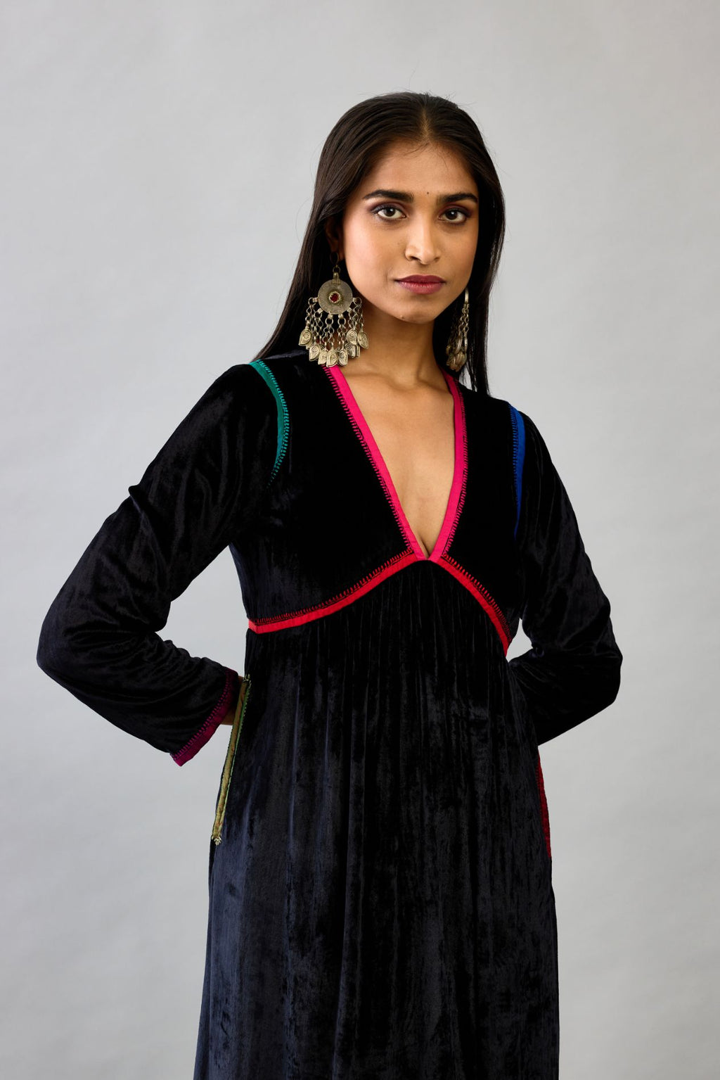 Black silk velvet kurta dress set with multi colored silk facing and embroidery details.