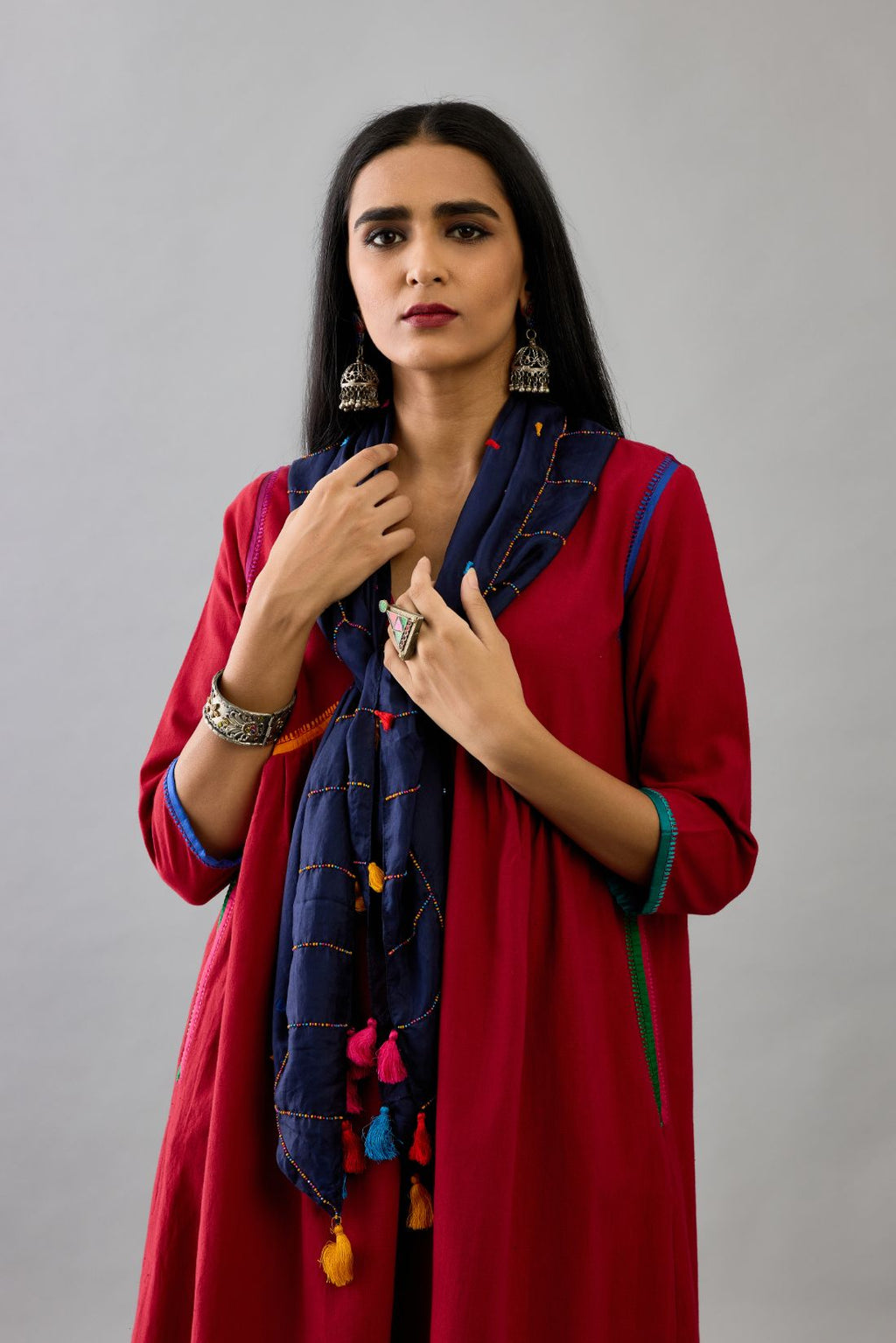 Red Handloom Cotton kurta set dress with multi colored silk facing and embroidery details.