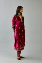 Fuchsia silk velvet straight kurta set with all-over zari, dori and contrast silk thread embroidery, highlighted with gold sequins work.