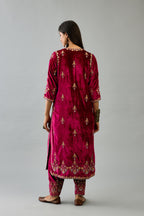 Fuchsia silk velvet straight kurta set with all-over zari, dori and contrast silk thread embroidery, highlighted with gold sequins work.