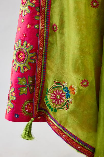 Apple green light silk dupatta with delicate silk thread embroidery, highlighted with braids, mirrors and sequins work.