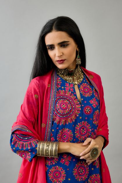 Fuchsia light silk dupatta with delicate silk thread embroidery, highlighted with braids, mirrors and sequins work.