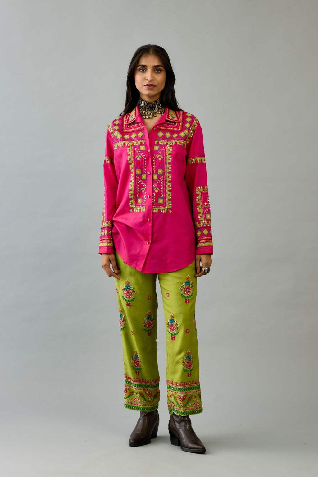 Fuchsia silk embroidered shirt set with full sleeves.