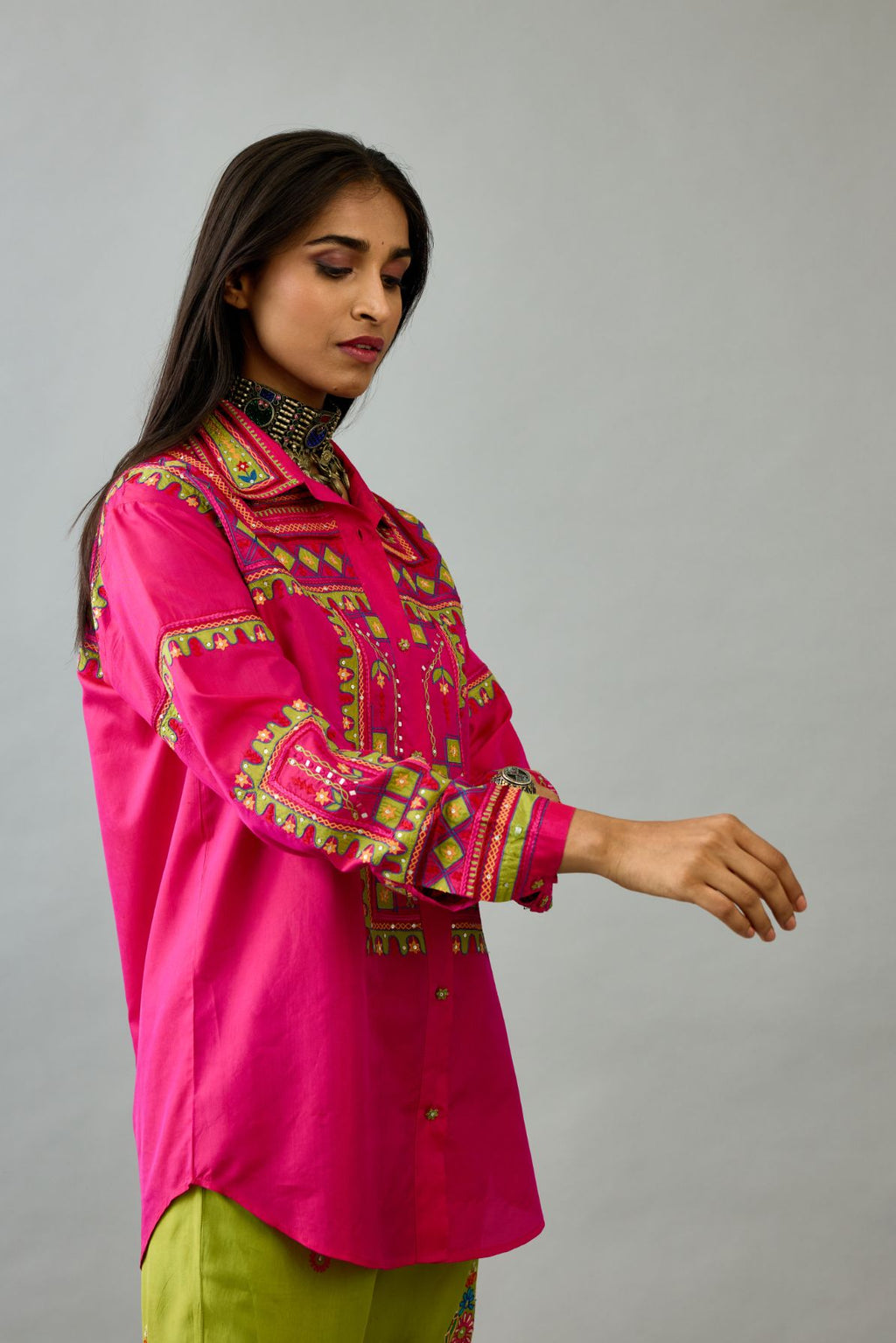 Fuchsia silk embroidered shirt set with full sleeves.