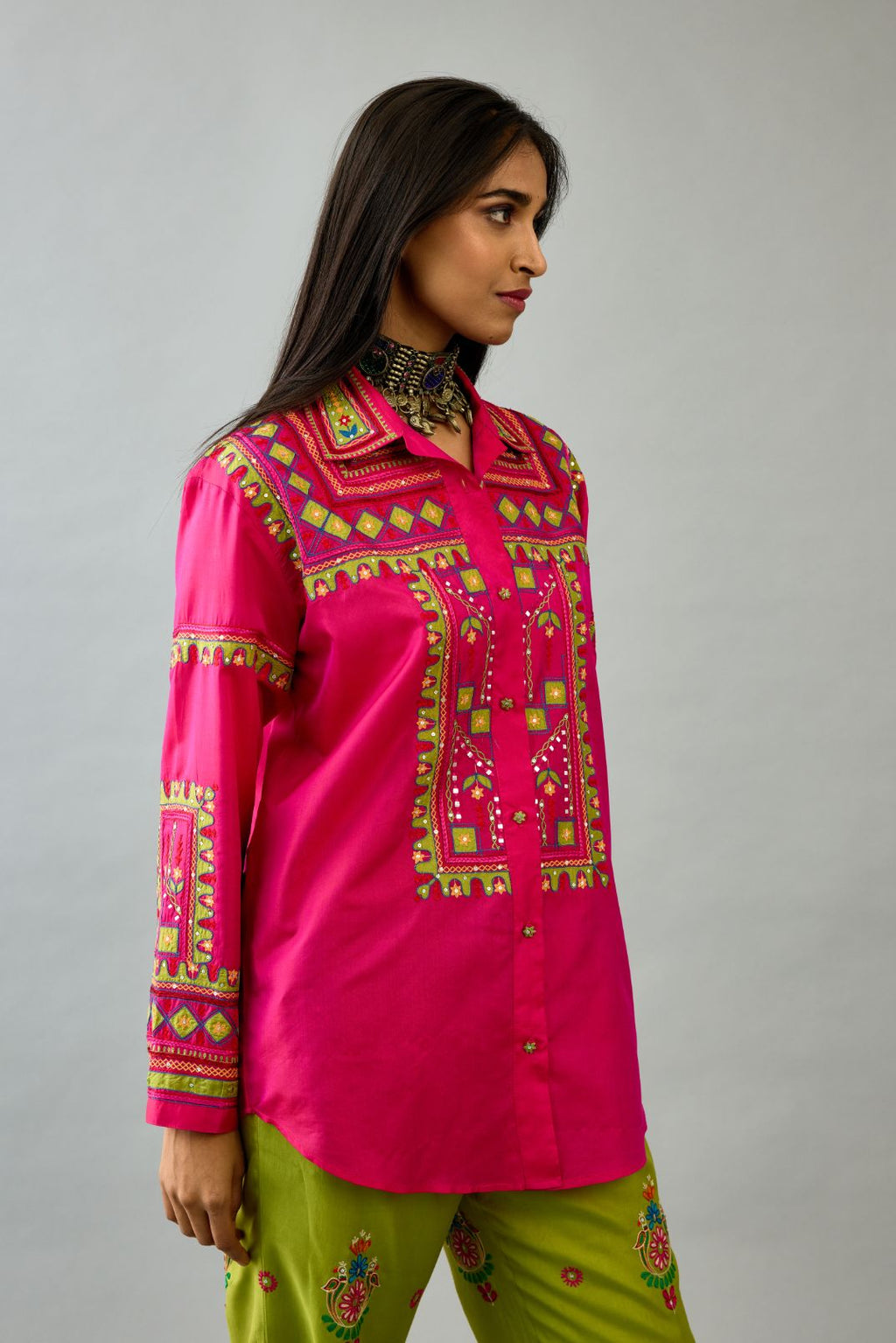 Fuchsia silk embroidered shirt set with full sleeves.