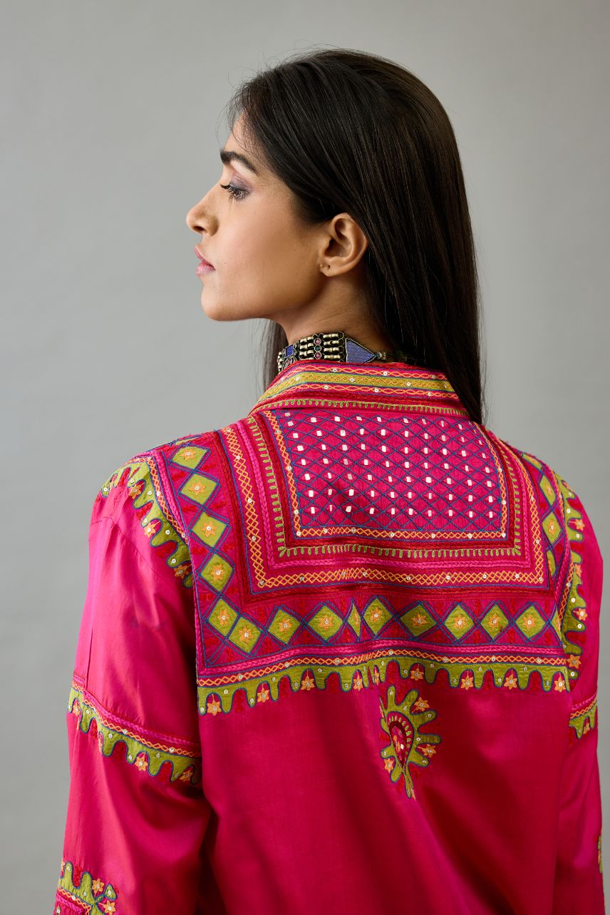 Fuchsia silk embroidered shirt set with full sleeves.