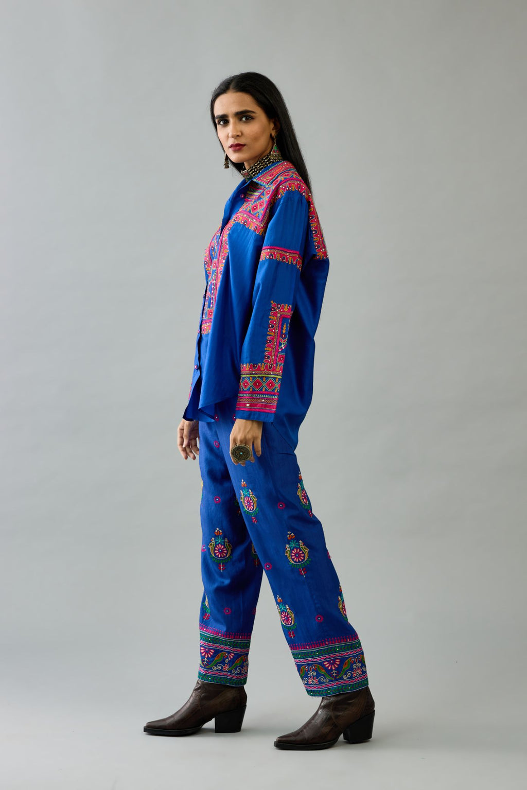 Blue silk embroidered shirt set with full sleeves.