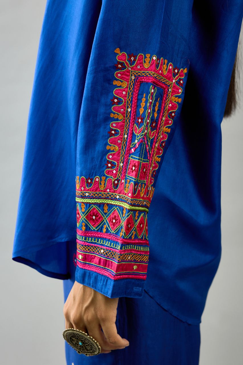 Blue silk embroidered shirt set with full sleeves.