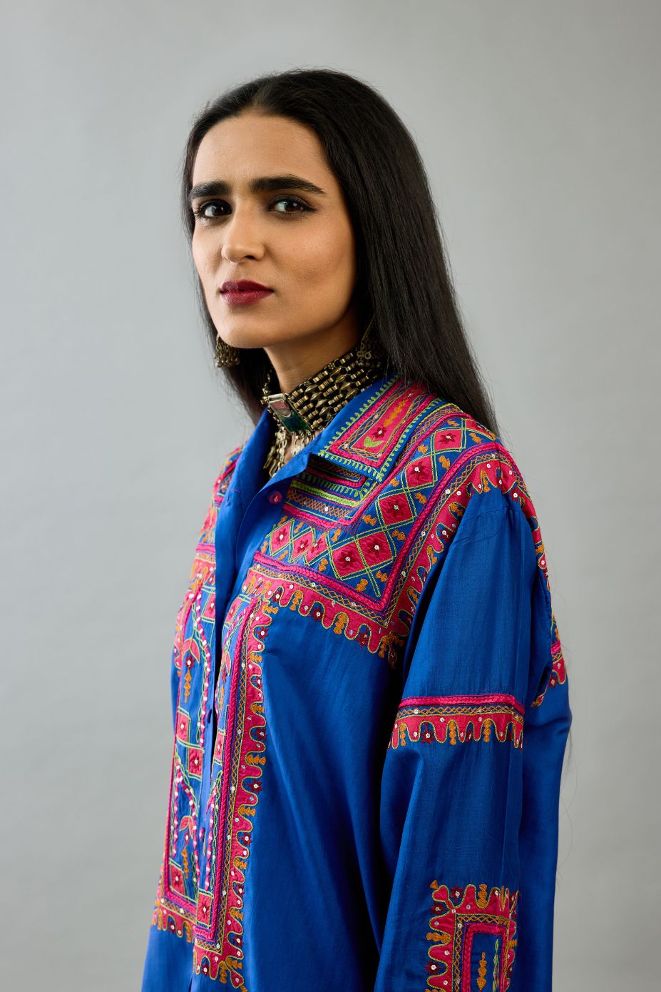 Blue silk embroidered shirt set with full sleeves.