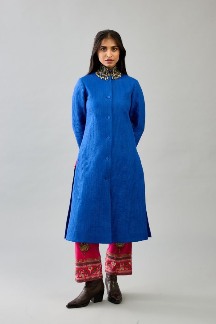 Blue silk, quilted mid-length front open jacket set.