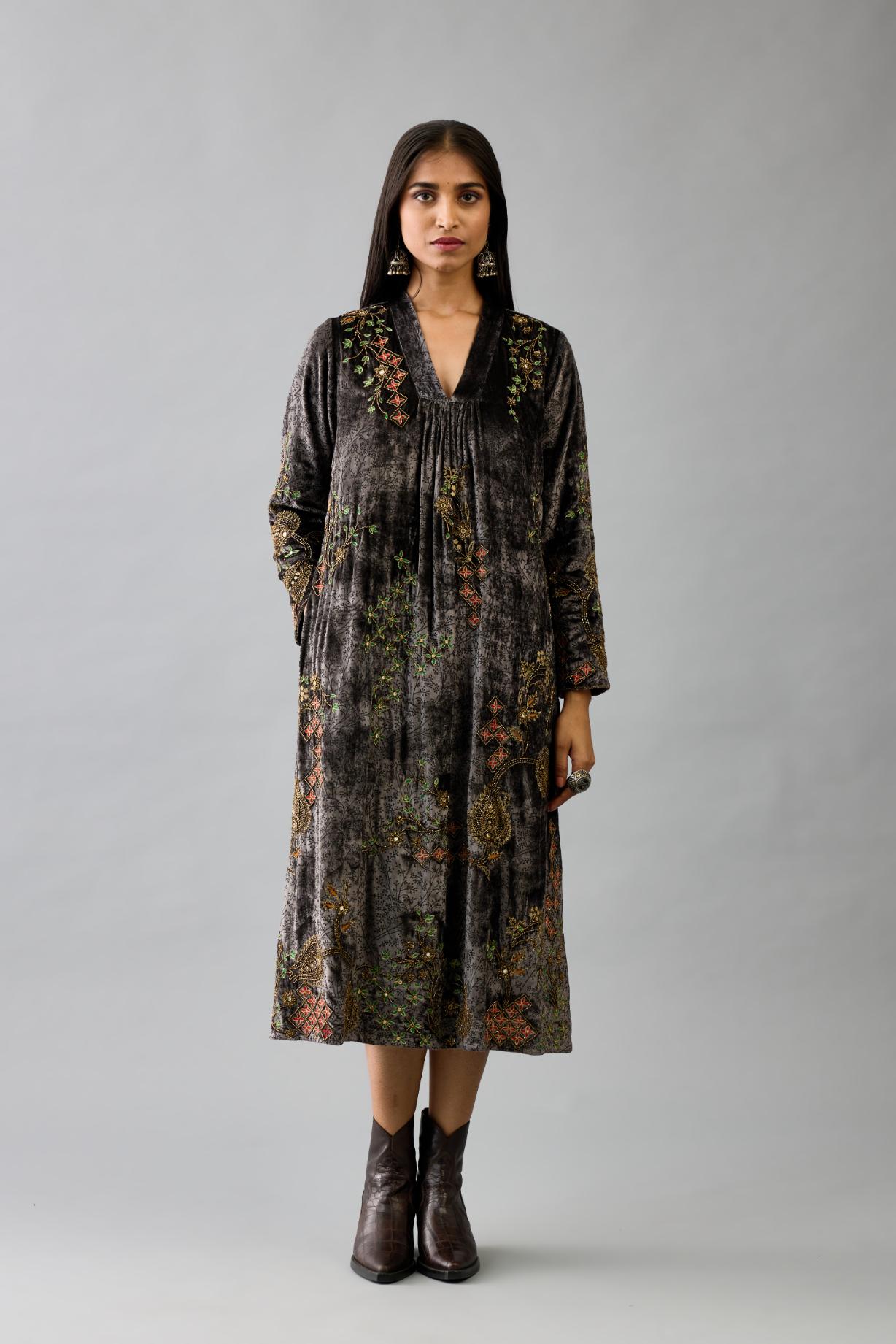Grey silk velvet hand block printed easy fit dress with, highlighted with beads, sequins and zari work, paired with blue light silk narrow stole with bugle beads fringes.
