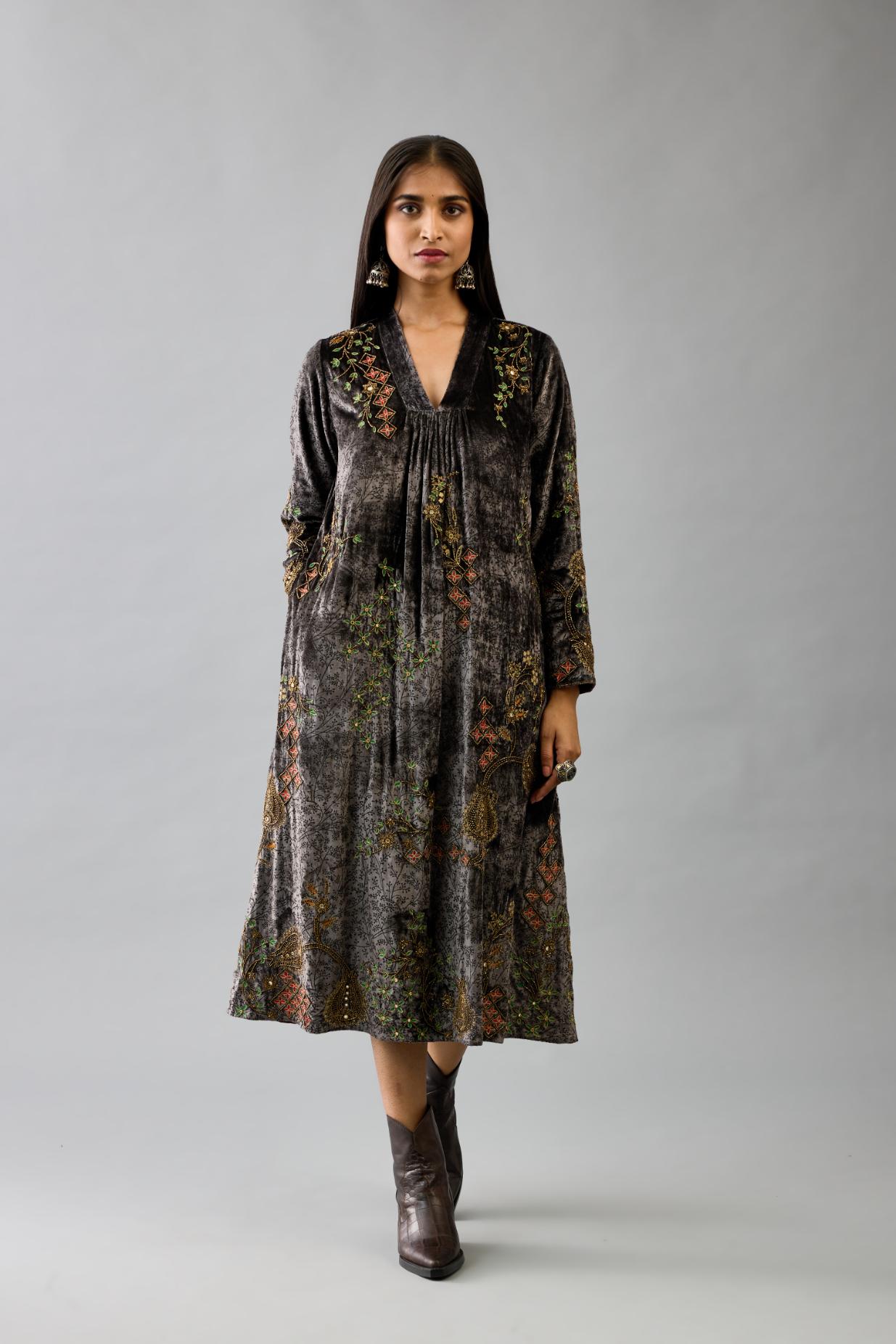 Grey silk velvet hand block printed easy fit dress with, highlighted with beads, sequins and zari work, paired with blue light silk narrow stole with bugle beads fringes.