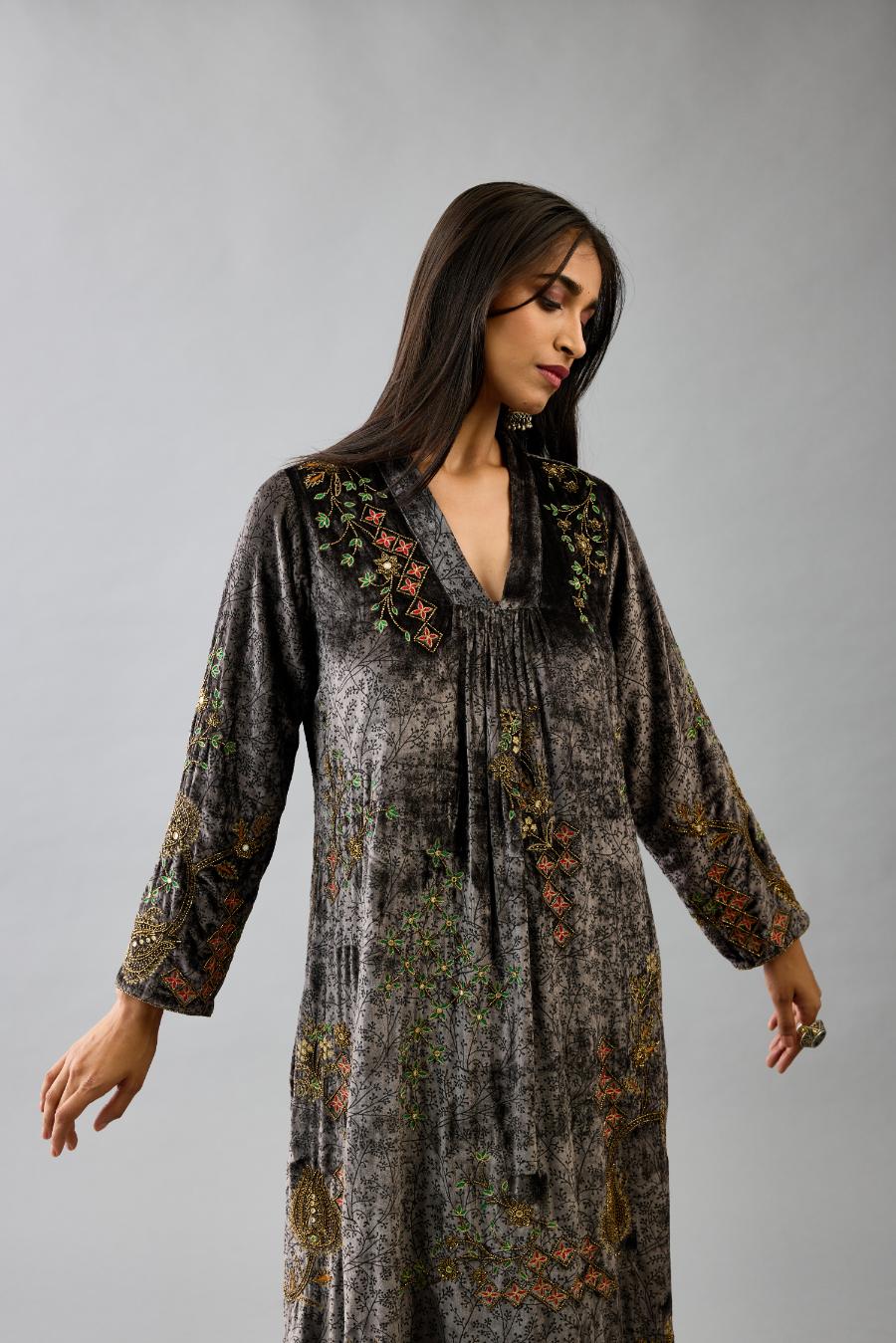 Grey silk velvet hand block printed easy fit dress with, highlighted with beads, sequins and zari work, paired with blue light silk narrow stole with bugle beads fringes.
