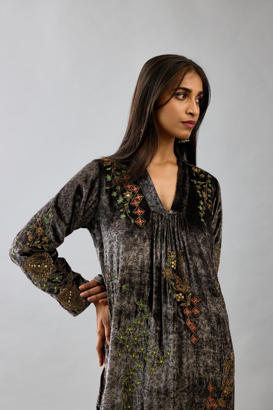 Grey silk velvet hand block printed easy fit dress with, highlighted with beads, sequins and zari work, paired with blue light silk narrow stole with bugle beads fringes.