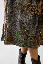 Grey silk velvet hand block printed easy fit dress with, highlighted with beads, sequins and zari work, paired with blue light silk narrow stole with bugle beads fringes.