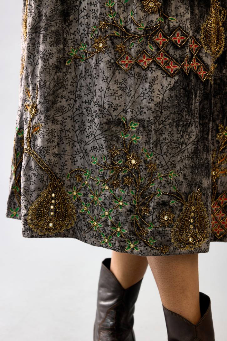 Grey silk velvet hand block printed easy fit dress with, highlighted with beads, sequins and zari work, paired with blue light silk narrow stole with bugle beads fringes.