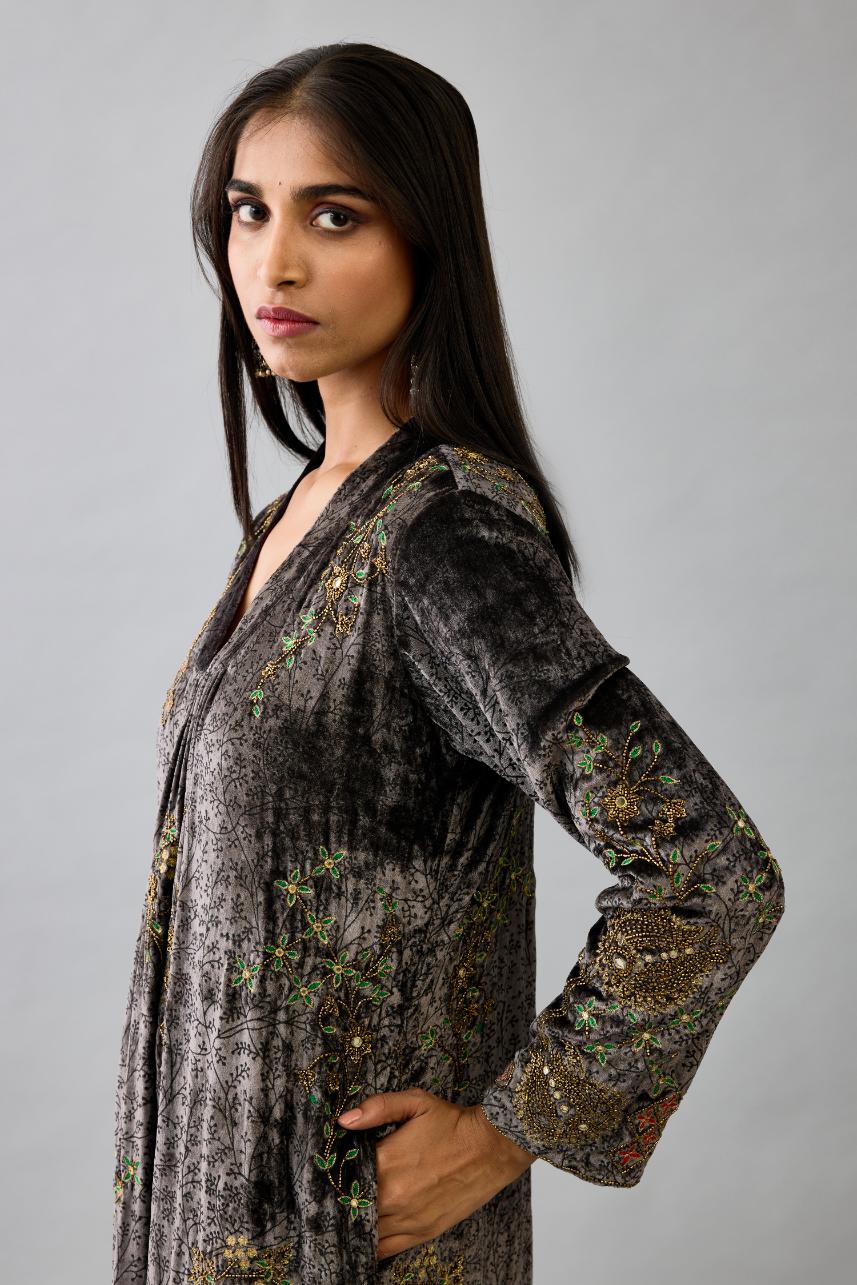 Grey silk velvet hand block printed easy fit dress with, highlighted with beads, sequins and zari work, paired with blue light silk narrow stole with bugle beads fringes.