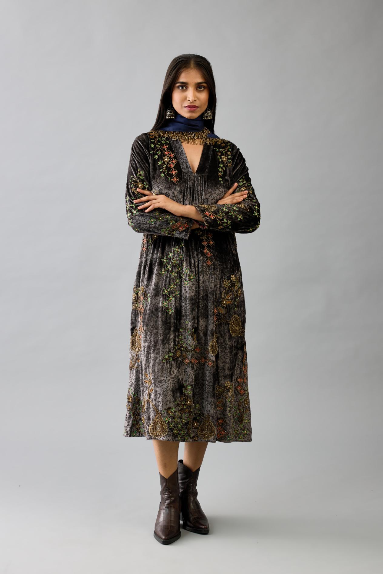 Grey silk velvet hand block printed easy fit dress with, highlighted with beads, sequins and zari work, paired with blue light silk narrow stole with bugle beads fringes.