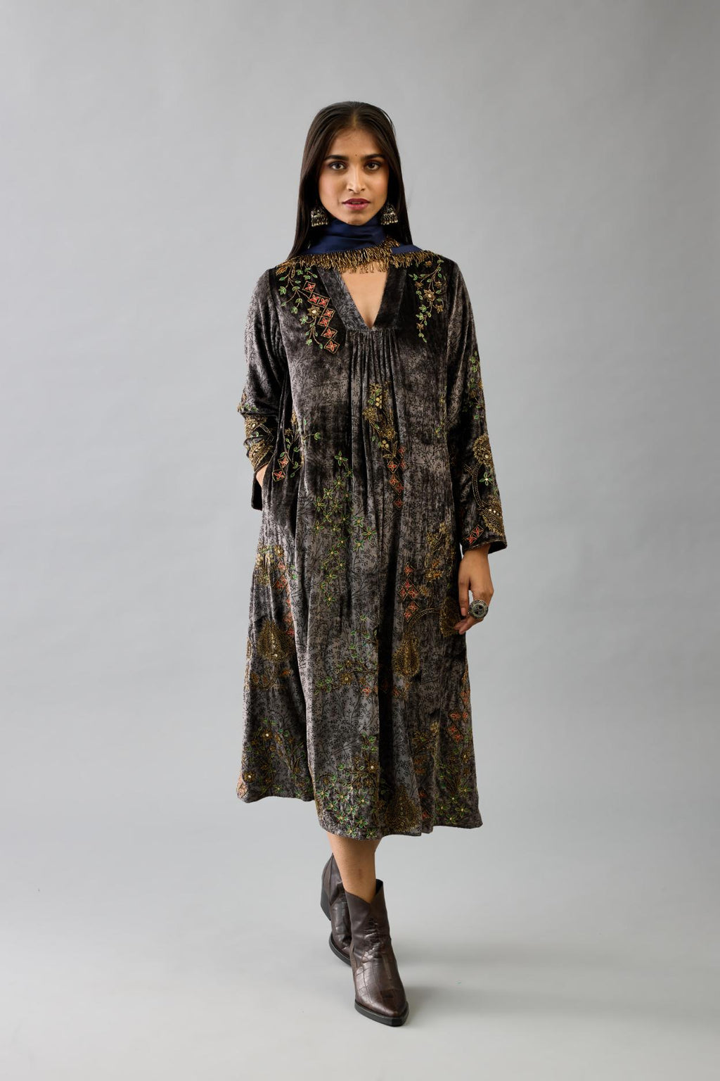 Grey silk velvet hand block printed easy fit dress with, highlighted with beads, sequins and zari work, paired with blue light silk narrow stole with bugle beads fringes.