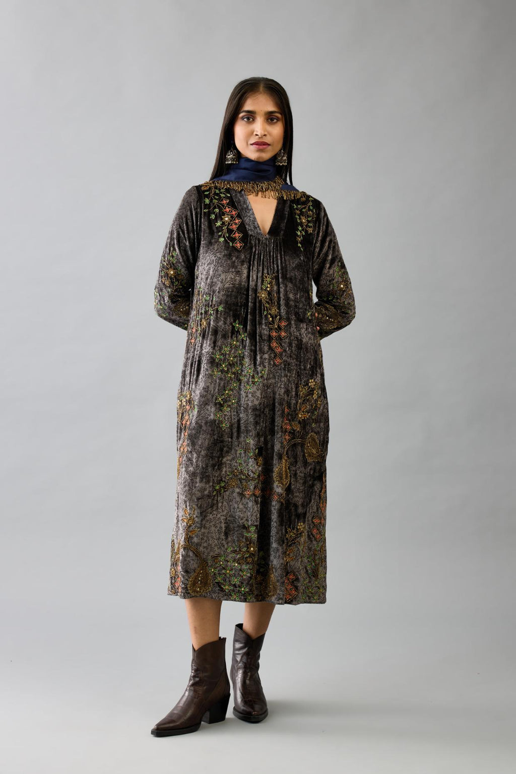 Grey silk velvet hand block printed easy fit dress with, highlighted with beads, sequins and zari work, paired with blue light silk narrow stole with bugle beads fringes.