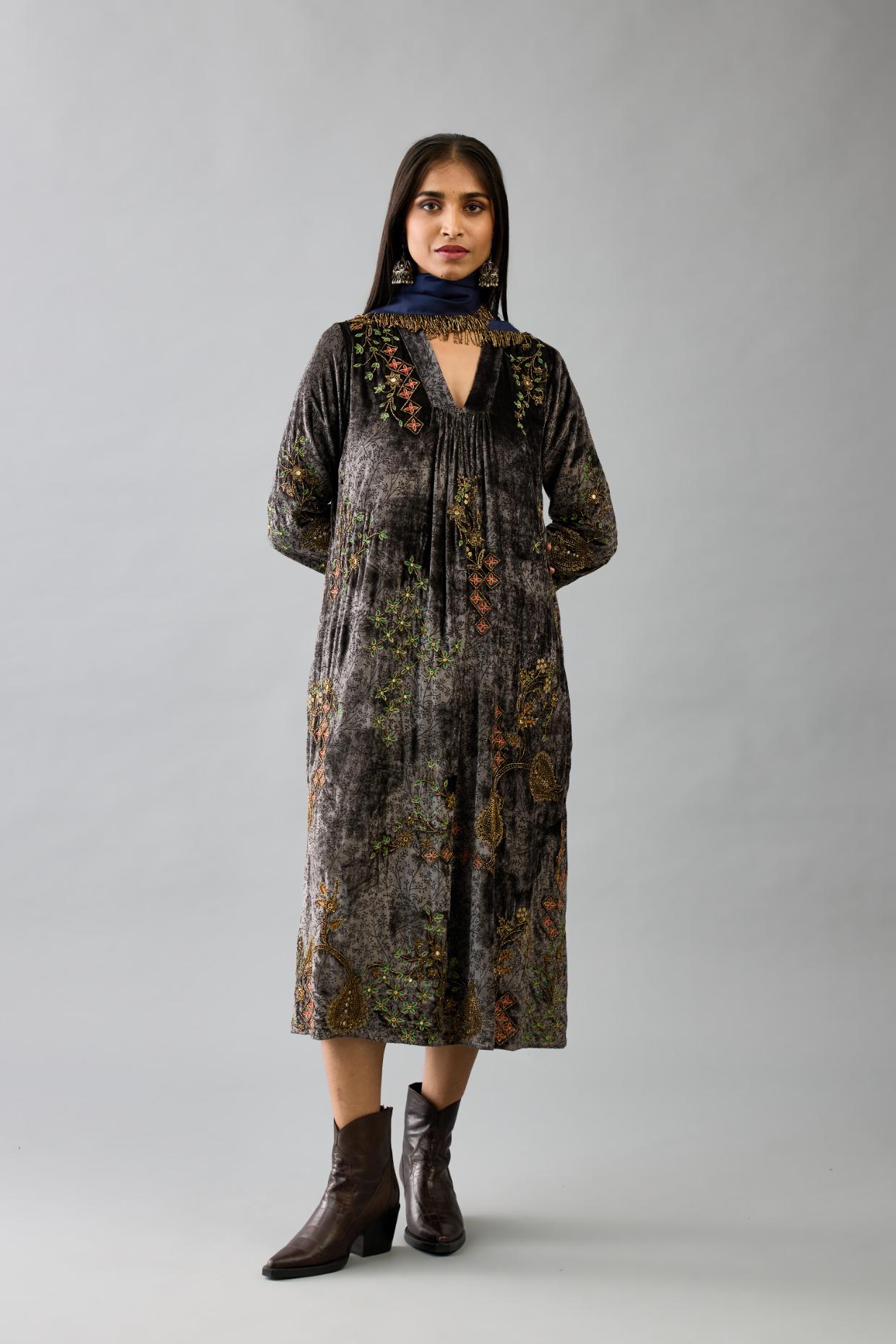 Grey silk velvet hand block printed easy fit dress with, highlighted with beads, sequins and zari work, paired with blue light silk narrow stole with bugle beads fringes.