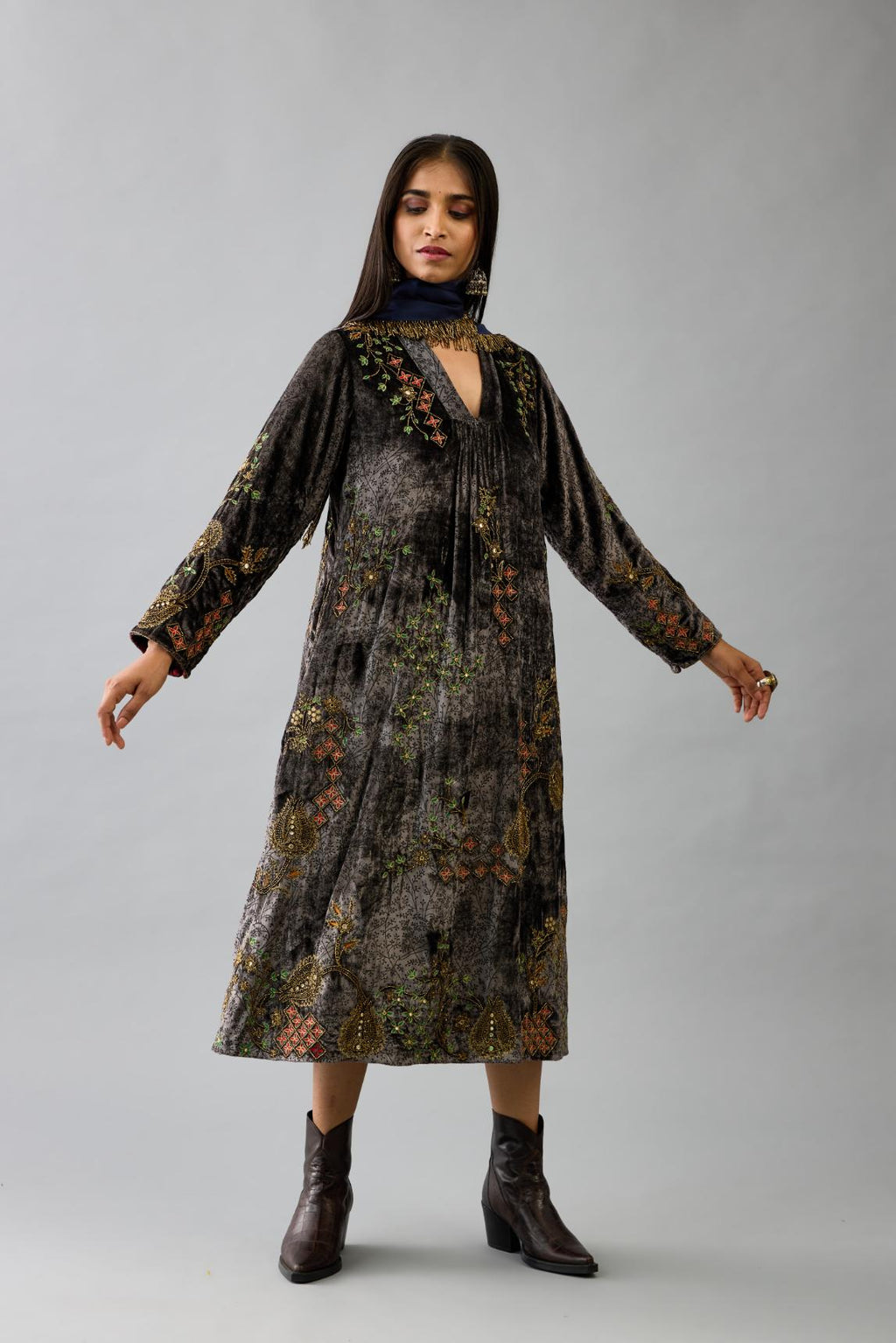 Grey silk velvet hand block printed easy fit dress with, highlighted with beads, sequins and zari work, paired with blue light silk narrow stole with bugle beads fringes.