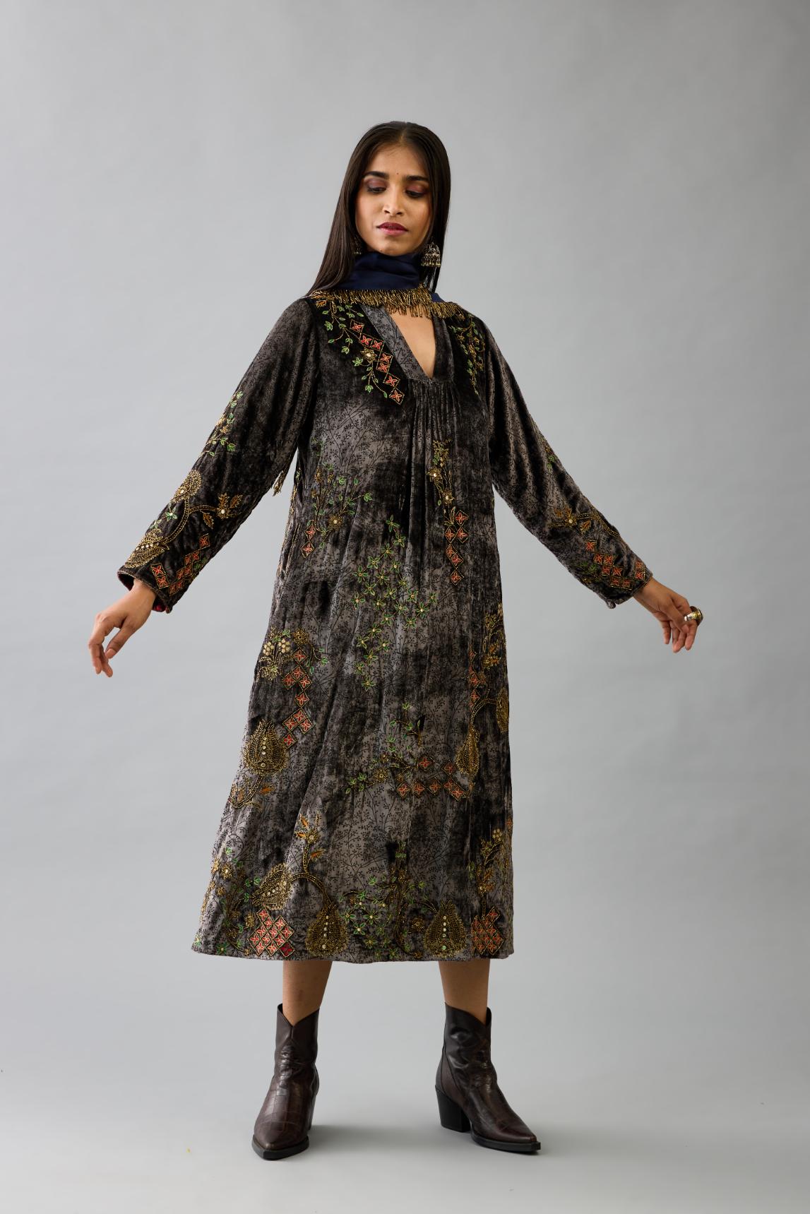 Grey silk velvet hand block printed easy fit dress with, highlighted with beads, sequins and zari work, paired with blue light silk narrow stole with bugle beads fringes.