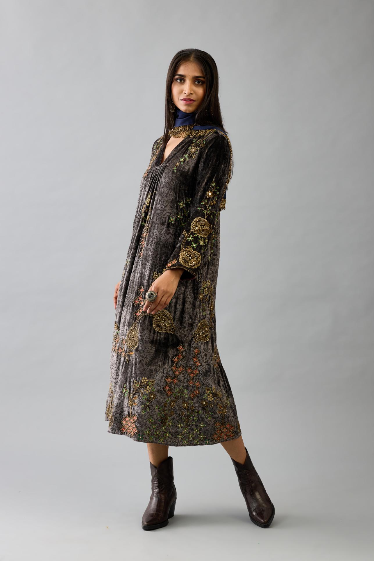 Grey silk velvet hand block printed easy fit dress with, highlighted with beads, sequins and zari work, paired with blue light silk narrow stole with bugle beads fringes.