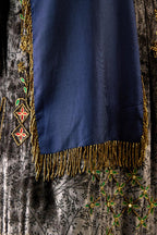 Grey silk velvet hand block printed easy fit dress with, highlighted with beads, sequins and zari work, paired with blue light silk narrow stole with bugle beads fringes.