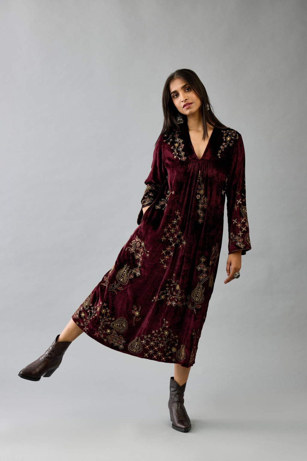 Maroon silk velvet hand block printed easy fit dress with, highlighted with beads, sequins and zari work, paired with green light silk narrow stole with bugle beads fringes.