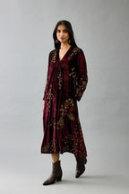 Maroon silk velvet hand block printed easy fit dress with, highlighted with beads, sequins and zari work, paired with green light silk narrow stole with bugle beads fringes.