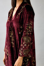 Maroon silk velvet hand block printed easy fit dress with, highlighted with beads, sequins and zari work, paired with green light silk narrow stole with bugle beads fringes.