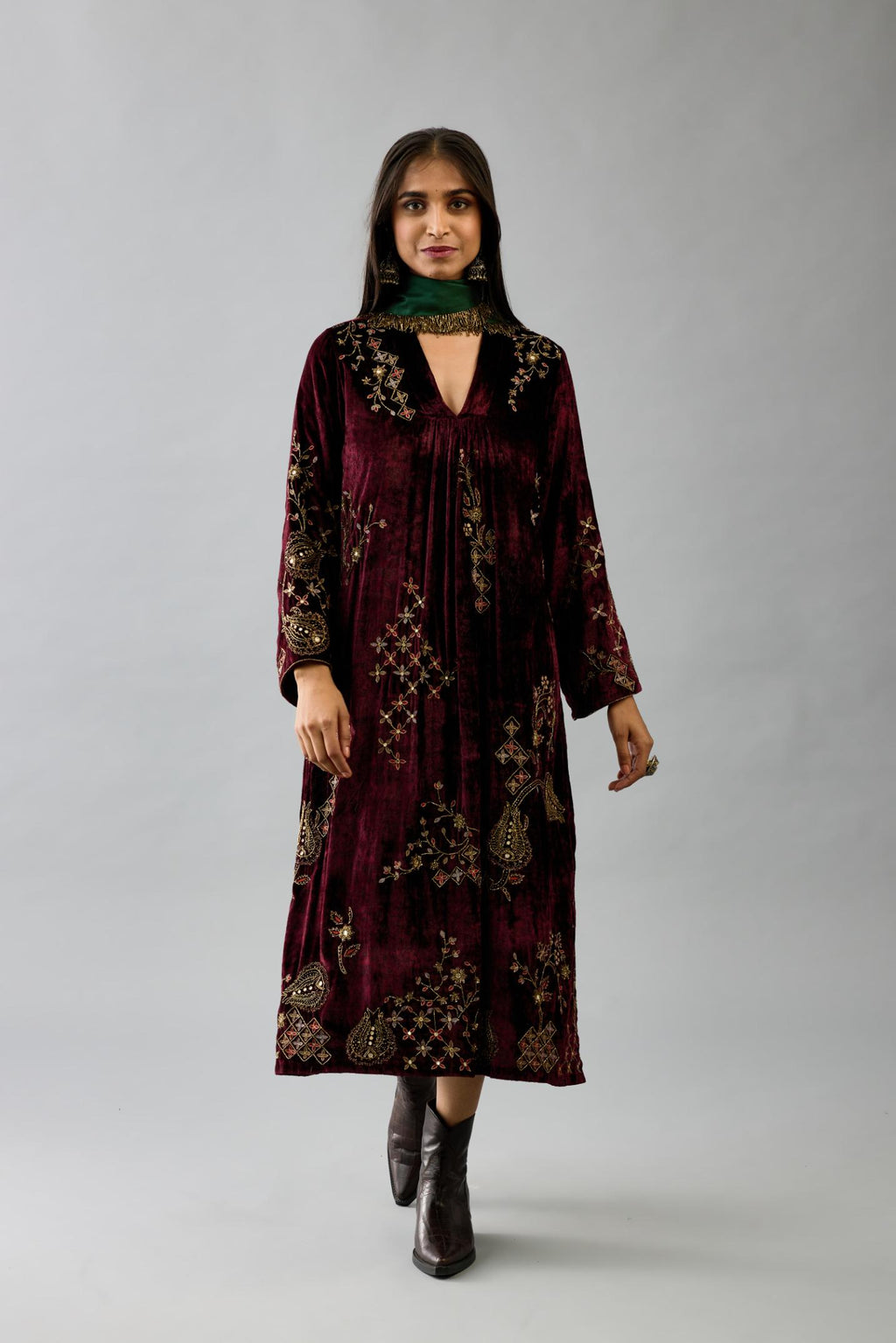 Maroon silk velvet hand block printed easy fit dress with, highlighted with beads, sequins and zari work, paired with green light silk narrow stole with bugle beads fringes.
