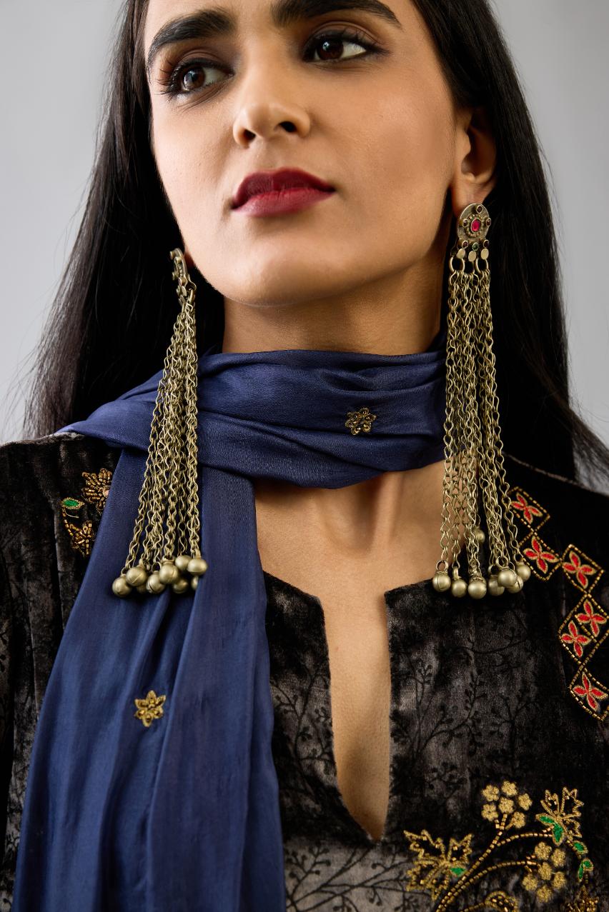 Blue light silk stole with all-over small embroidered booti and fringes at sides.