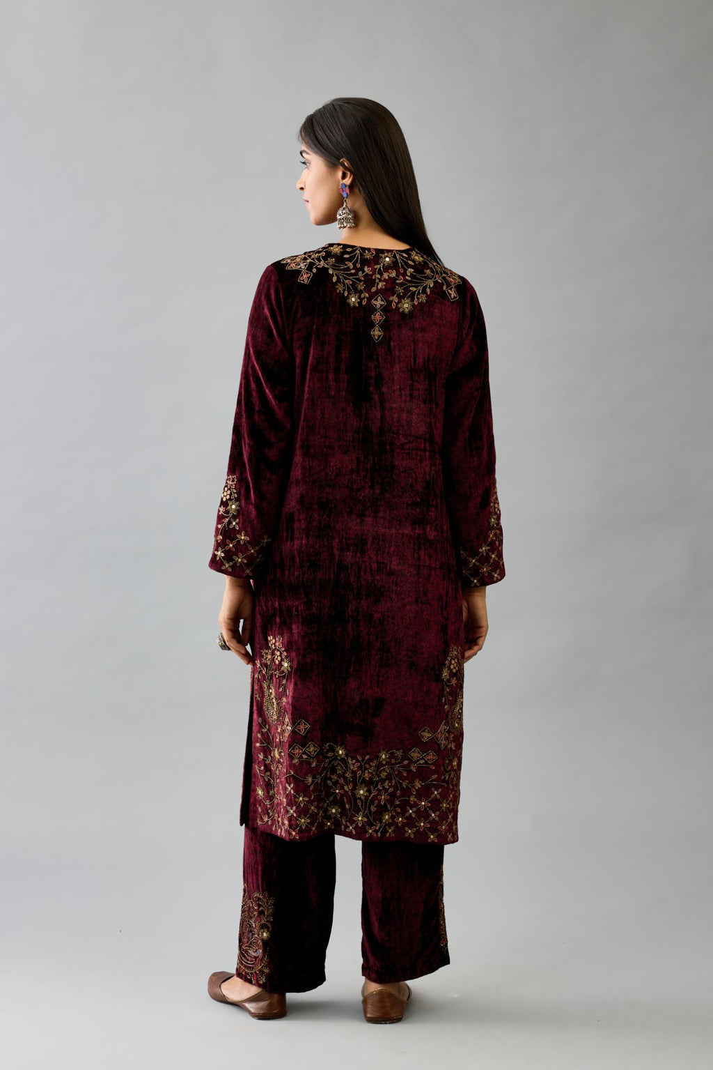 Maroon silk velvet straight mid length kurta with all-over hand block print, highlighted with beads, sequins and zari work at neck & hem.