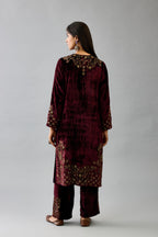 Maroon silk velvet straight mid length kurta with all-over hand block print, highlighted with beads, sequins and zari work at neck & hem.