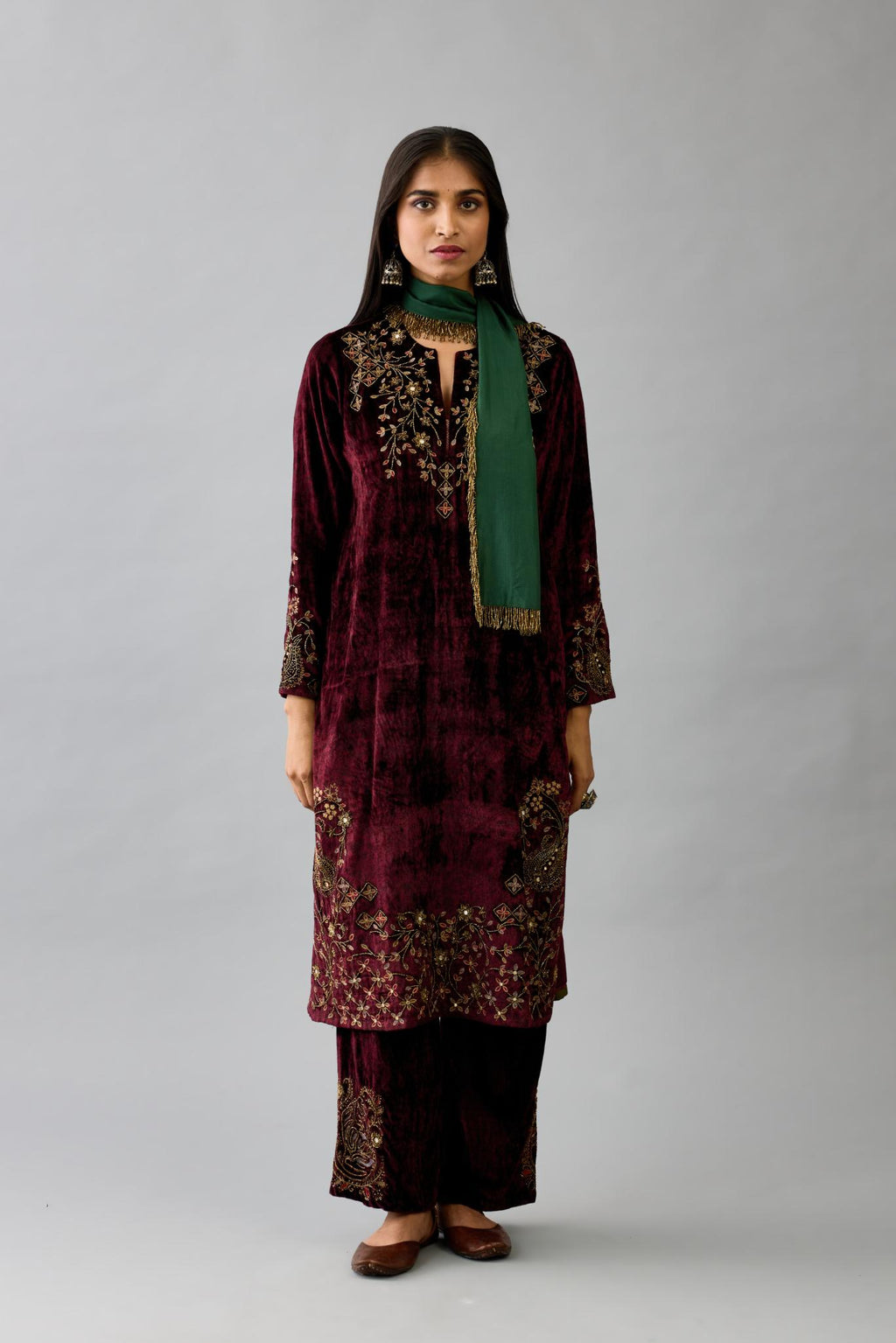 Maroon silk velvet straight mid length kurta with all-over hand block print, highlighted with beads, sequins and zari work at neck & hem.