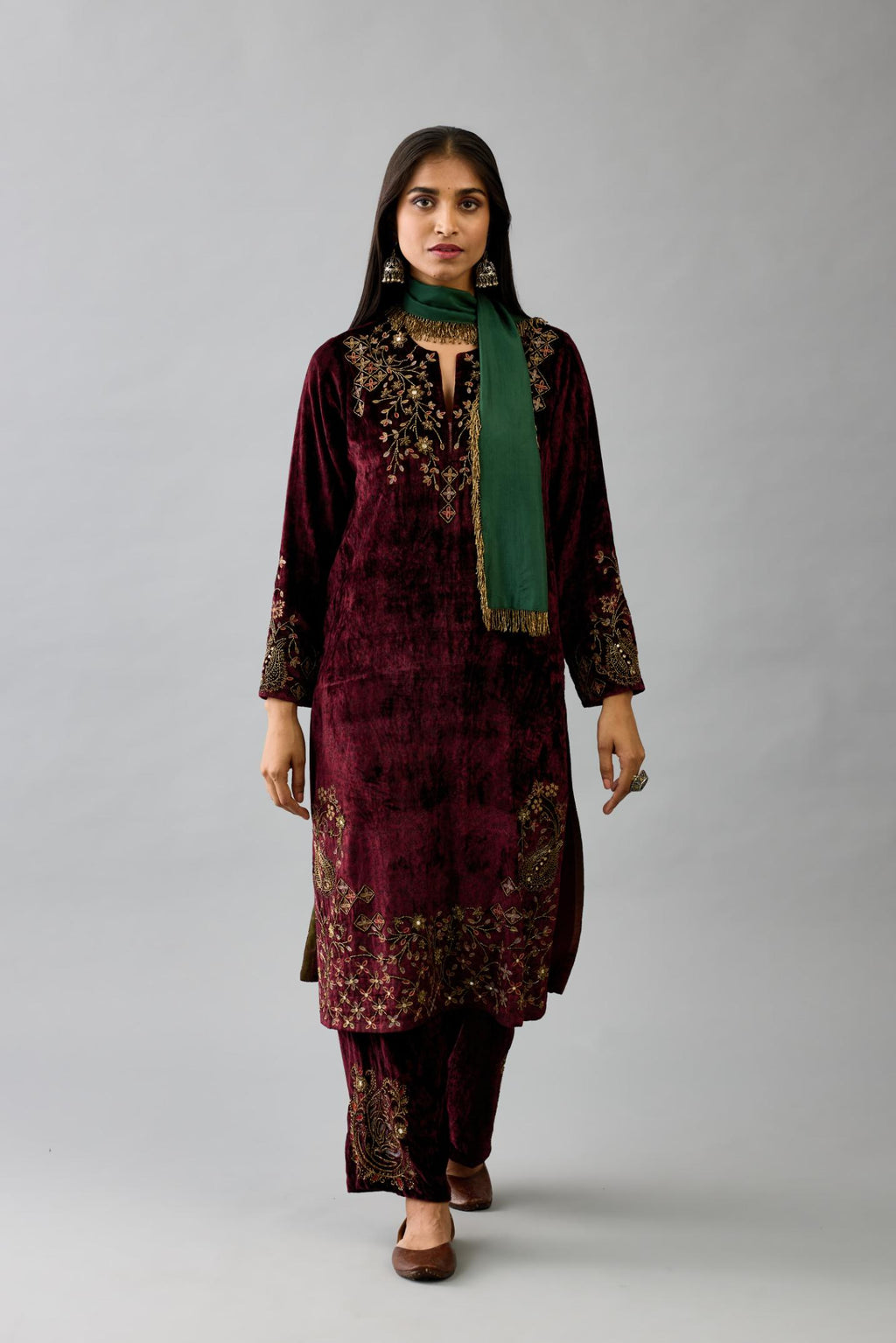 Maroon silk velvet straight mid length kurta with all-over hand block print, highlighted with beads, sequins and zari work at neck & hem.
